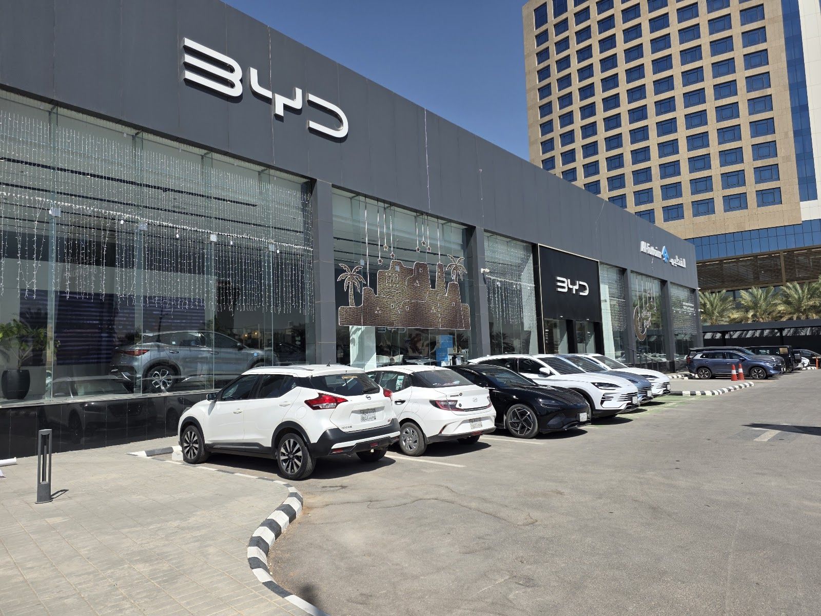 BYD showroom — Al-Futtaim Electric Mobility in Riyadh / Jeddah
